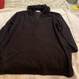 Black cover-up with a hood.